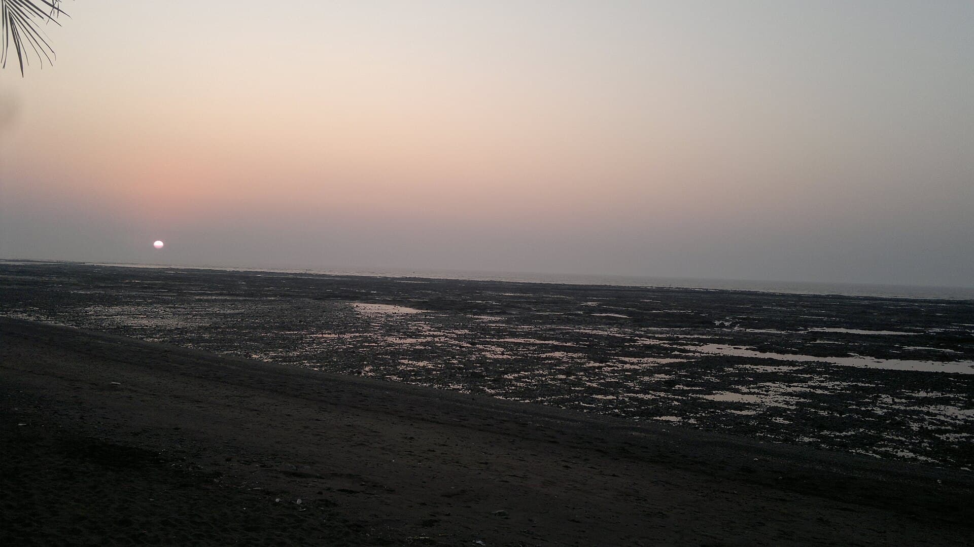 Sunset over the tidal flats in Daman