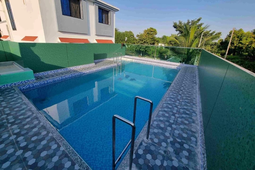 Private swimming pool at Mango Farmhouse Kamrej Surat