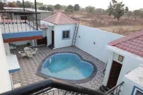 3 BHK farmhouse with a private pool in Dorli, Nagpur (BMF-F306)