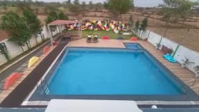 3 BHK farmhouse with a private pool in Jamgaon, Raipur (BMF-F537)