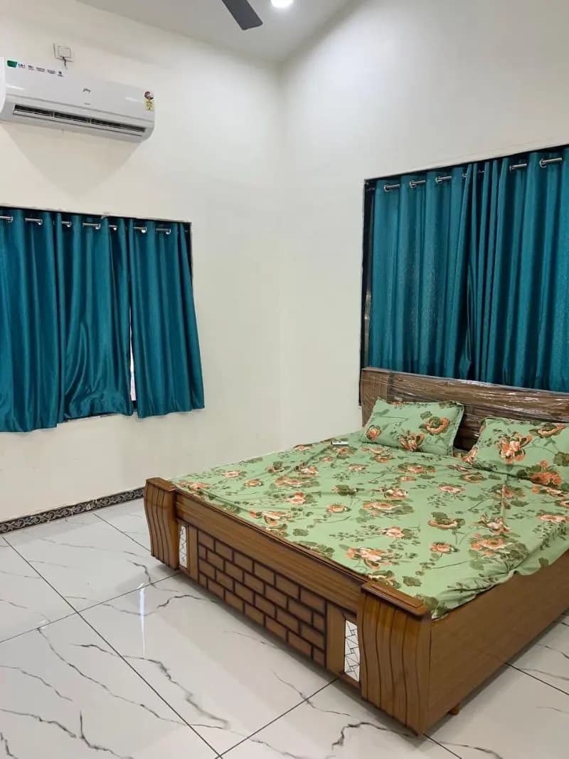 Garden and outdoor space at Mahadev Stay, Kakarkhad, Ahmedabad