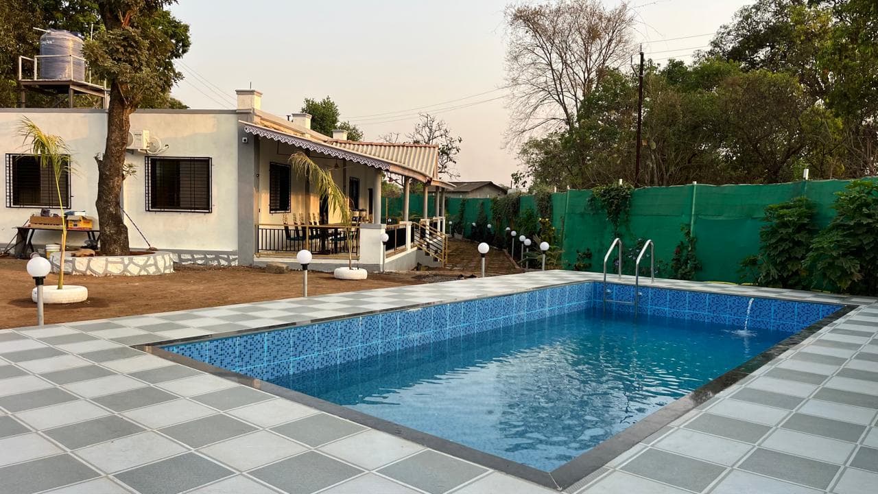Swimming pool at a weekend home in Neral, Karjat