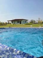 2 BHK farmhouse with a private pool in Toopran, Medak (BMF-F288)
